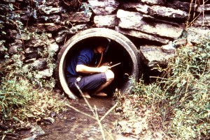 a boy in big pipe