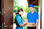 delivery man with woman